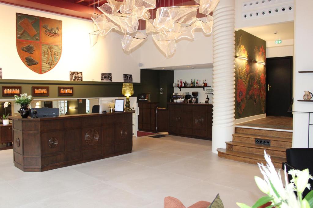 Vstupní hala nebo recepce v ubytování Hôtel La Truffe Noire