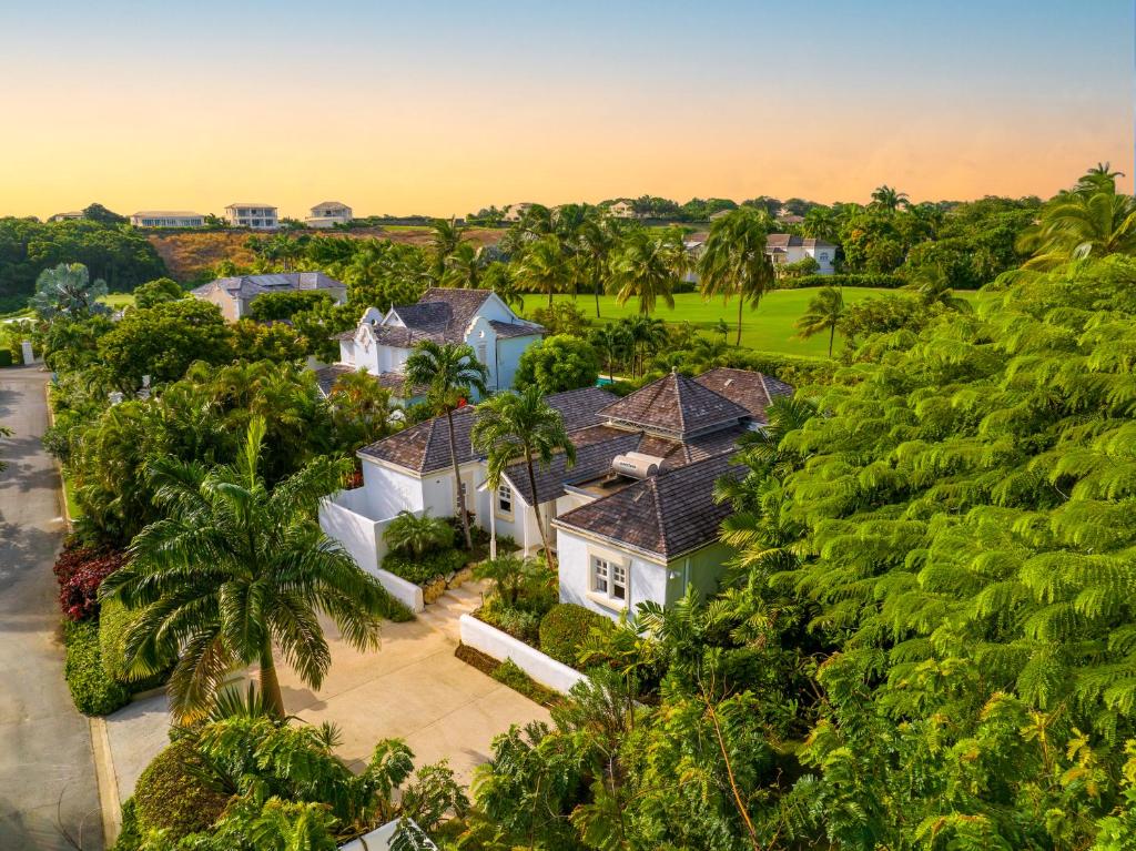 an aerial view of a house with palm trees at Coconut Grove 8 Luxury Villa by Island Villas in Saint James