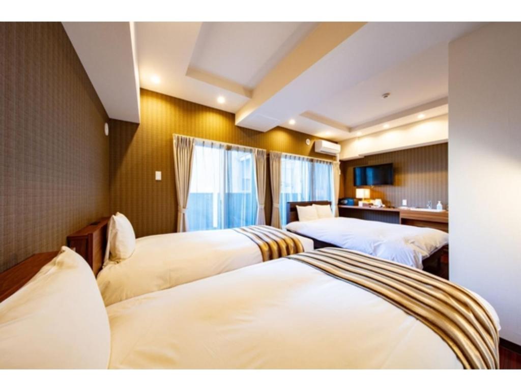 A bed or beds in a room at VILLA KOSHIDO KOTONI - Vacation STAY 49545v