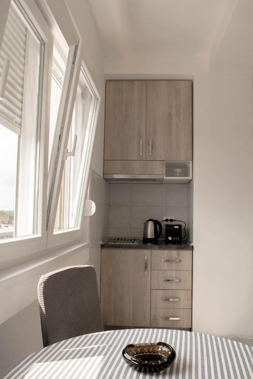Kuchyň nebo kuchyňský kout v ubytování Meli apartman