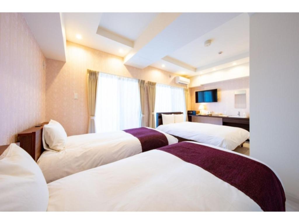 Een bed of bedden in een kamer bij VILLA KOSHIDO KOTONI - Vacation STAY 49607v