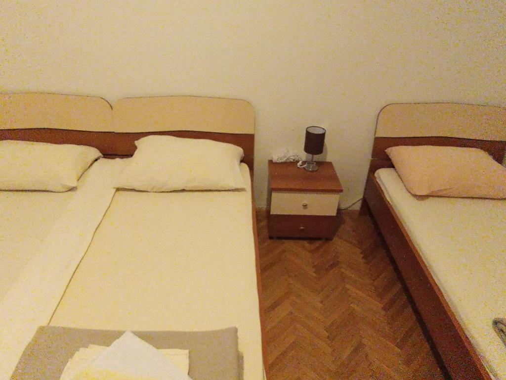 Postel nebo postele na pokoji v ubytování Jasna1