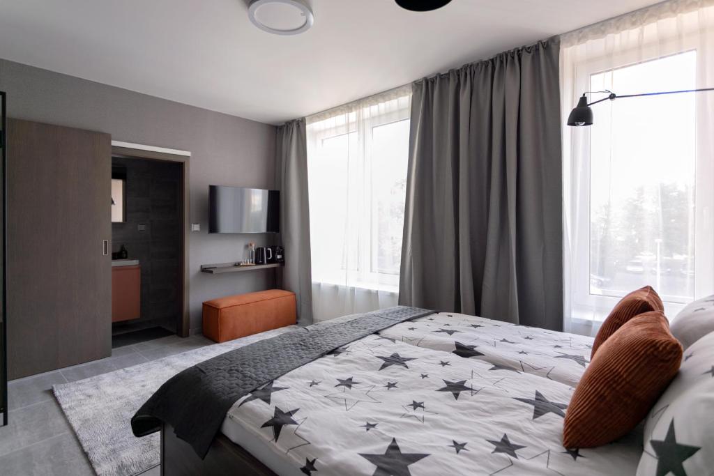 Postel nebo postele na pokoji v ubytování LUONG Europe Apartments