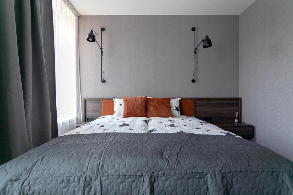 Postel nebo postele na pokoji v ubytování LUONG Europe Apartments