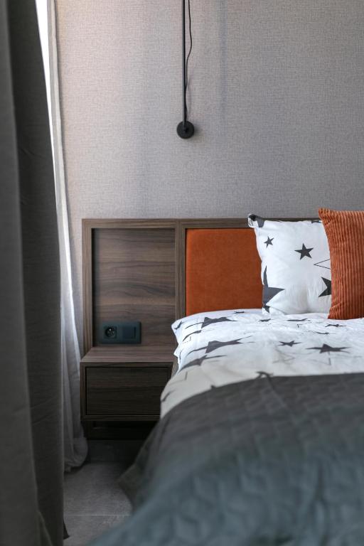 Postel nebo postele na pokoji v ubytování LUONG Europe Apartments