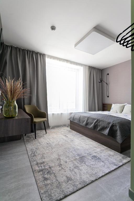 Postel nebo postele na pokoji v ubytování LUONG Europe Apartments