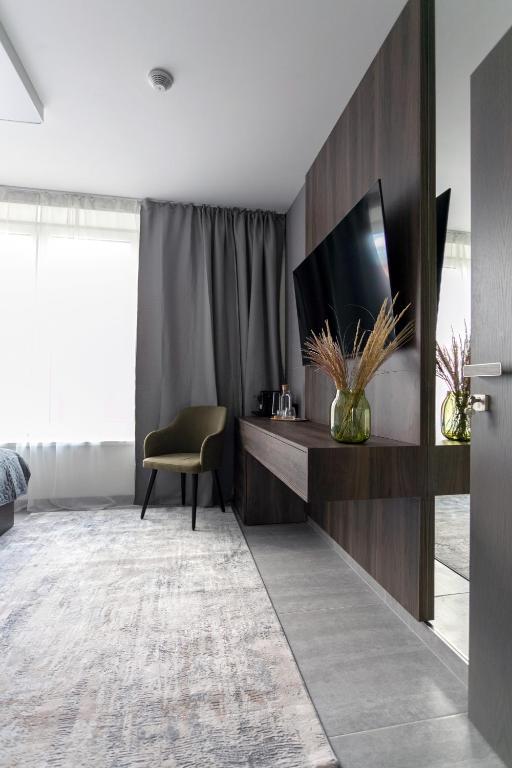 TV a/nebo společenská místnost v ubytování LUONG Europe Apartments
