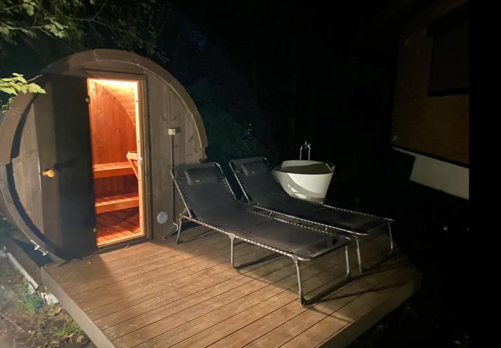 a wooden deck with a bath tub and a sink at Fandina Fujiwara - Vacation STAY 86194v in Tsumagoi