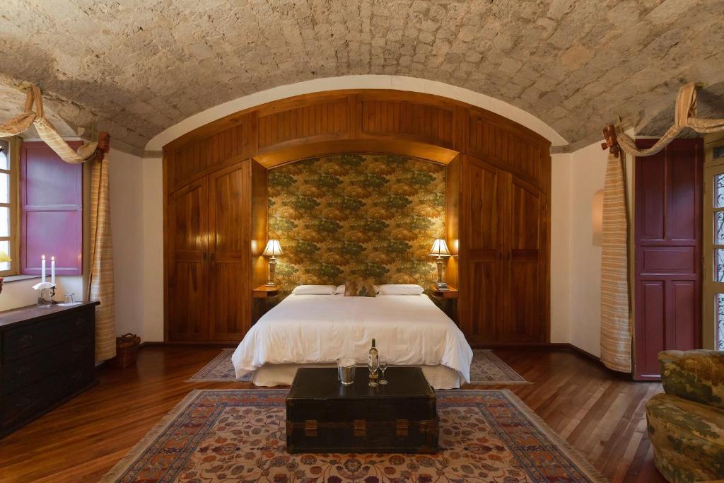 Postel nebo postele na pokoji v ubytování Hacienda La Cienega