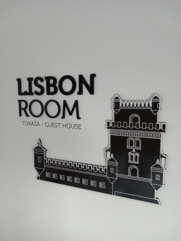 a black and white logo for the lisbon room at TuKaza - Guesthouse in Esposende