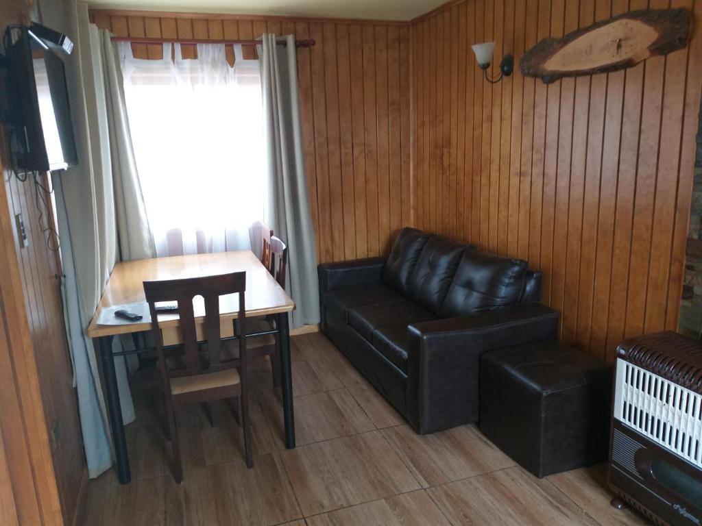Posezení v ubytování Hotel y Cabañas Pulegan
