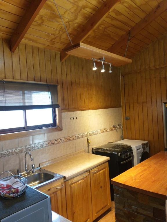Kuchyň nebo kuchyňský kout v ubytování Hotel y Cabañas Pulegan