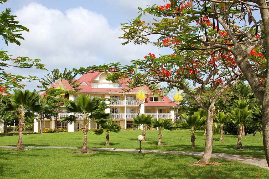 Zahrada ubytování TI OASIS Trinidad, Studio vue Mer à Pierre & Vacances