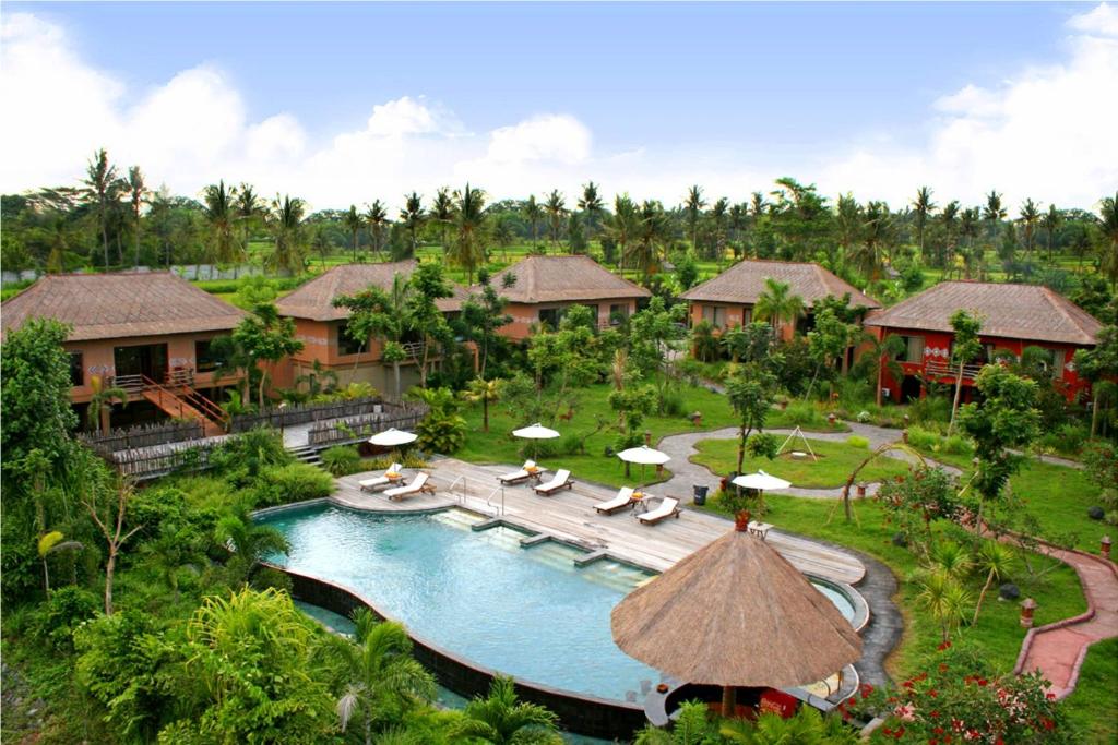 an aerial view of a resort with a swimming pool at Mara River Safari Lodge Bali in Keramas