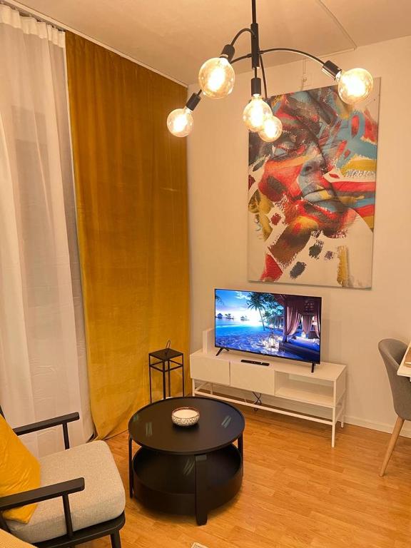 TV a/nebo společenská místnost v ubytování Noah Longstay Borås