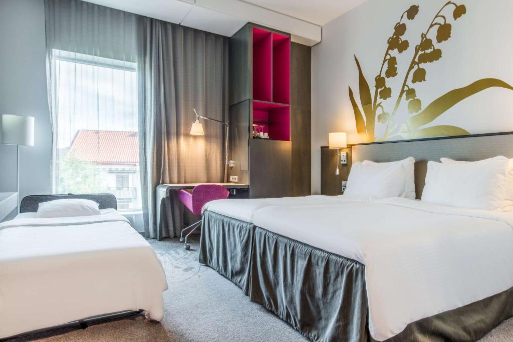 Postel nebo postele na pokoji v ubytování Radisson Blu Hotel Uppsala