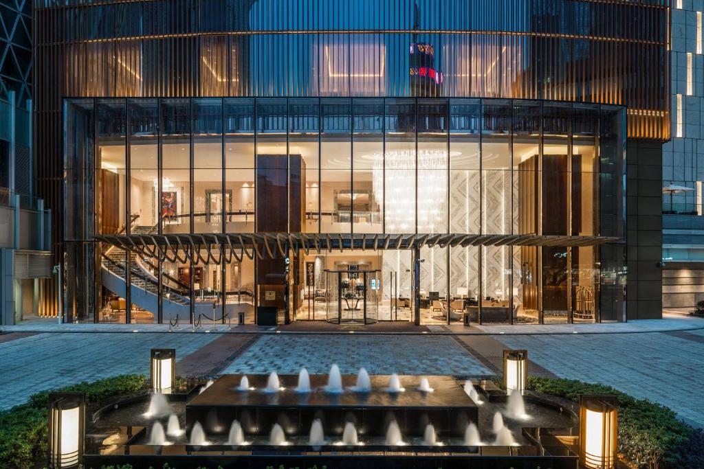 a lobby of a building with a lot of windows at The St. Regis Chengdu in Chengdu