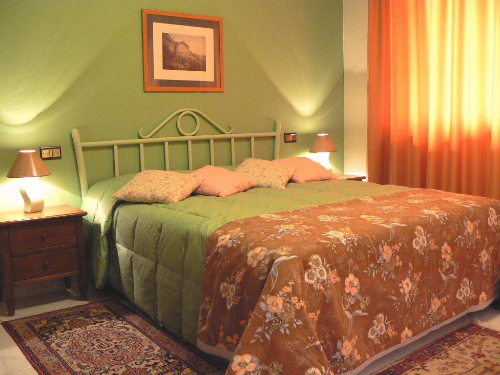 Postel nebo postele na pokoji v ubytování B&B Villa Sensi