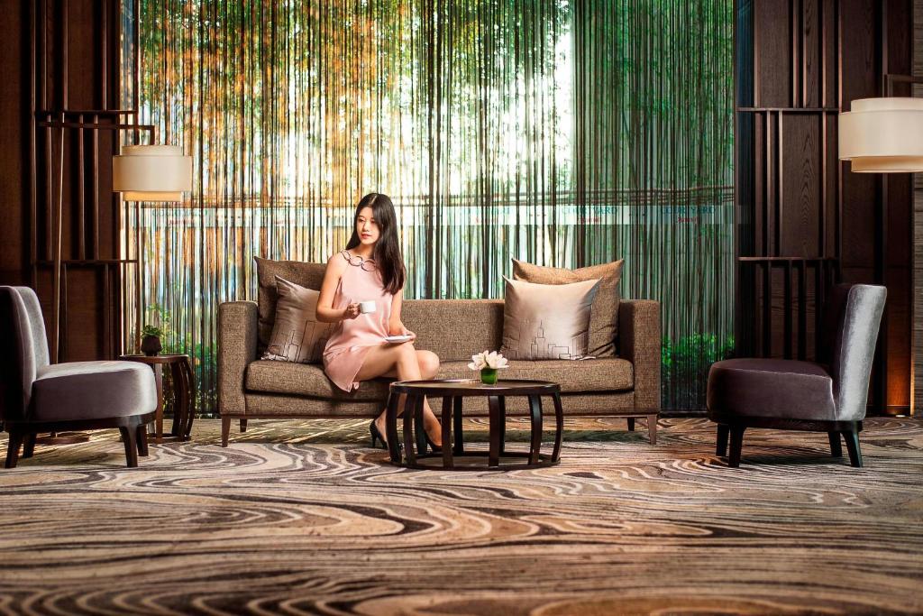Posezení v ubytování Courtyard by Marriott Shanghai International Tourism and Resorts Zone