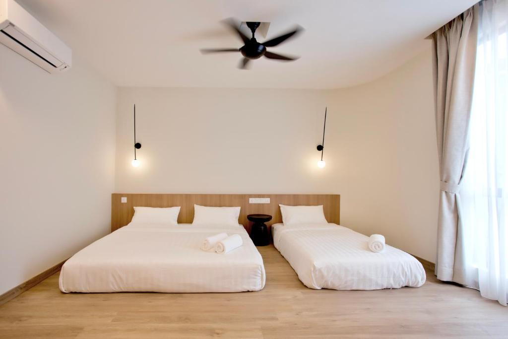Postel nebo postele na pokoji v ubytování Codrington House - Boutique Apartments