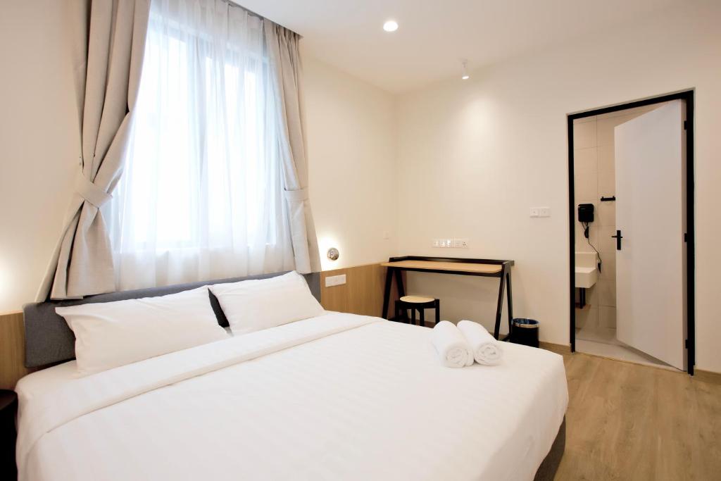 Postel nebo postele na pokoji v ubytování Codrington House - Boutique Apartments
