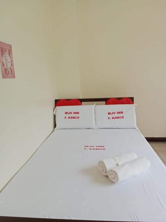 Postel nebo postele na pokoji v ubytování WJV INN RAMOS