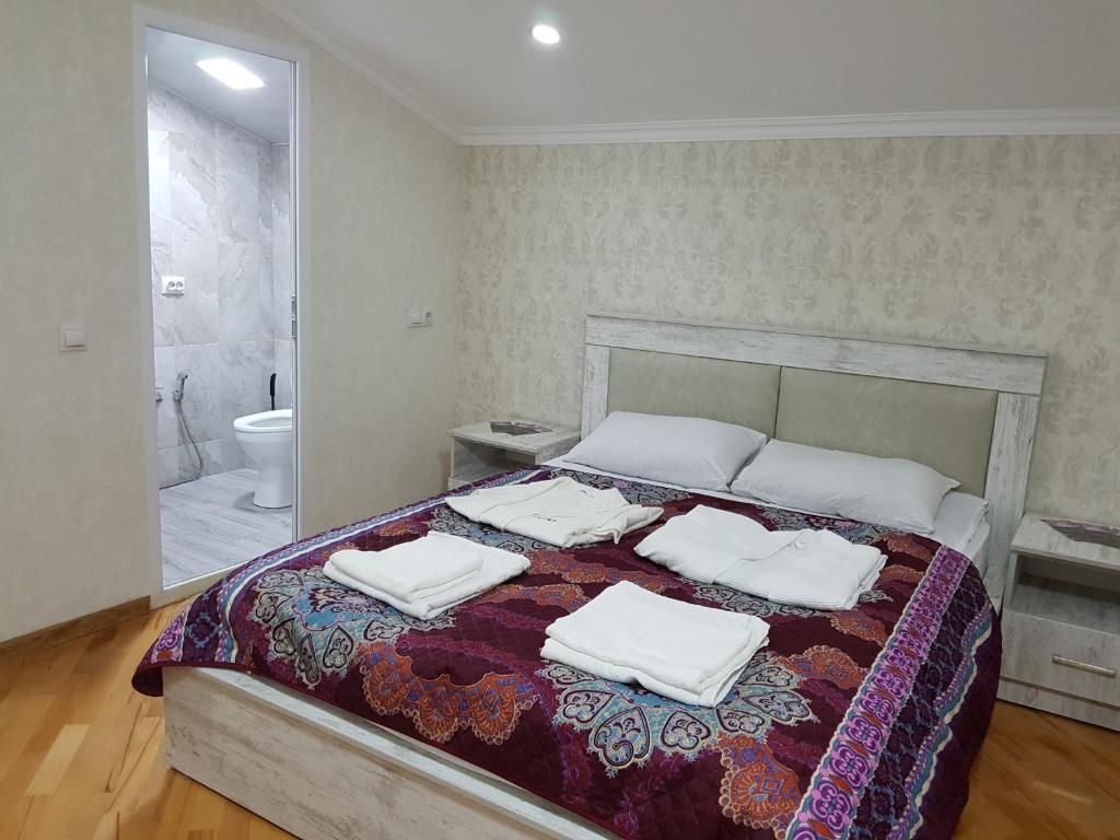 Postel nebo postele na pokoji v ubytování GUEST HOUSE 15A