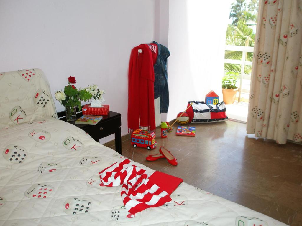 Postel nebo postele na pokoji v ubytování Hotel Florakis