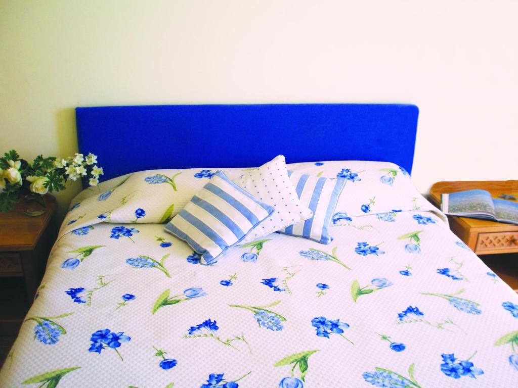 Postel nebo postele na pokoji v ubytování Hotel Florakis