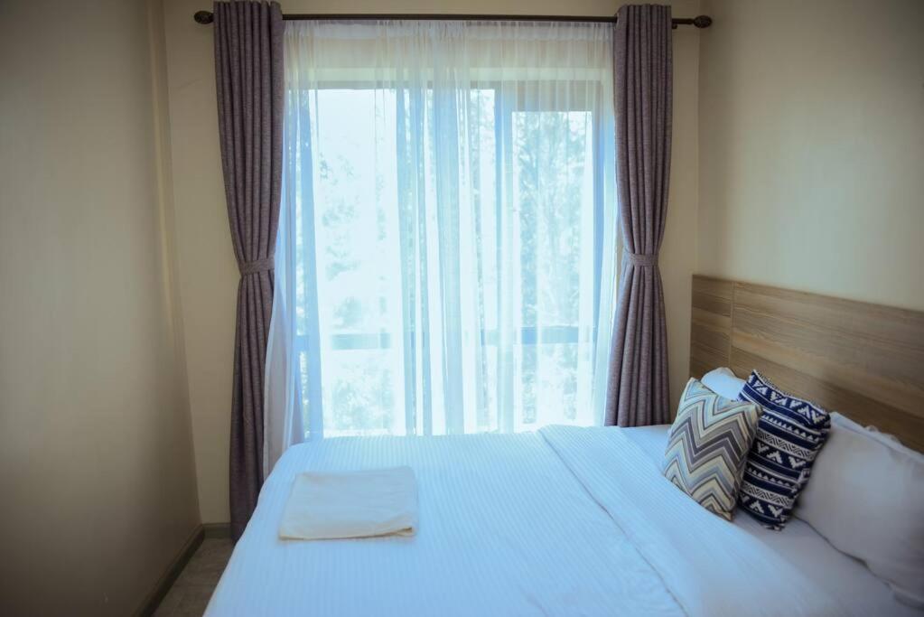 מיטה או מיטות בחדר ב-65chTv + Fast Wifi + Nature View