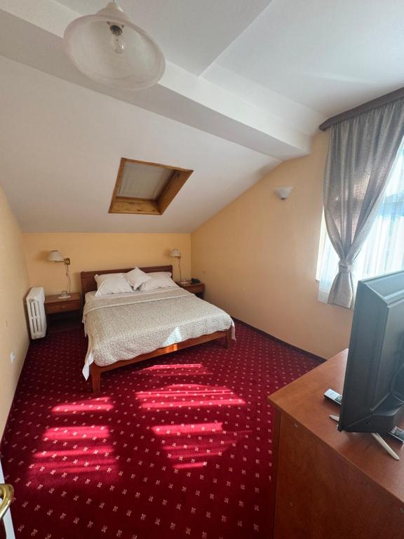 Postel nebo postele na pokoji v ubytování Ada Apartments