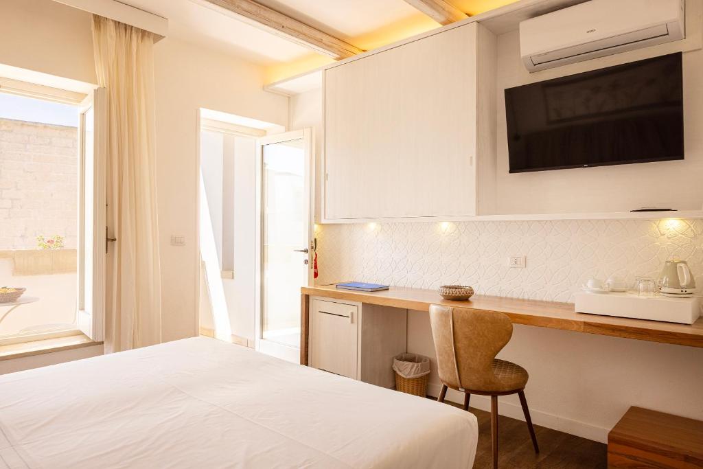Postel nebo postele na pokoji v ubytování Masseria Bandino & Spa