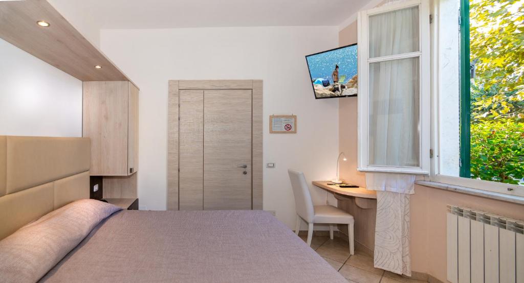 Postel nebo postele na pokoji v ubytování Hotel Eura