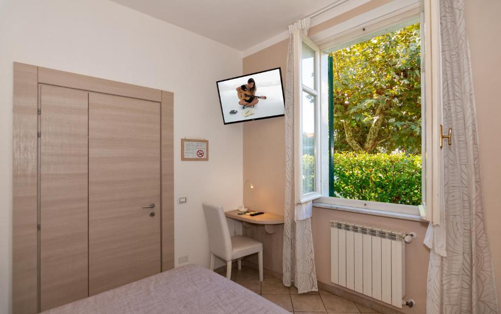 TV a/nebo společenská místnost v ubytování Hotel Eura