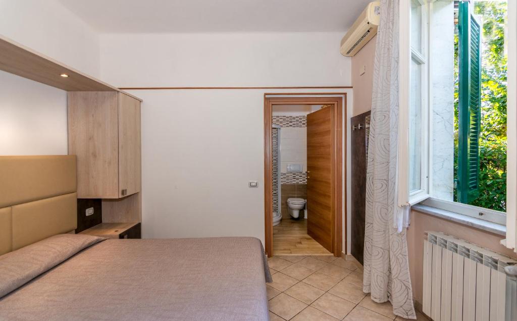 Postel nebo postele na pokoji v ubytování Hotel Eura