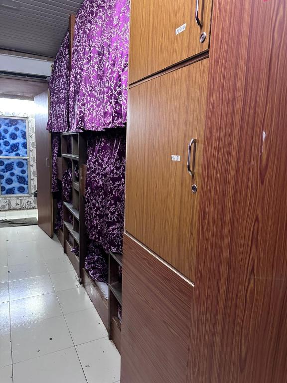 Fotografie z fotogalerie ubytování New Mahira Dormitory v Bombaji