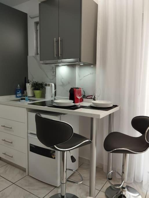 Kuchyň nebo kuchyňský kout v ubytování Kentrikon Guest House