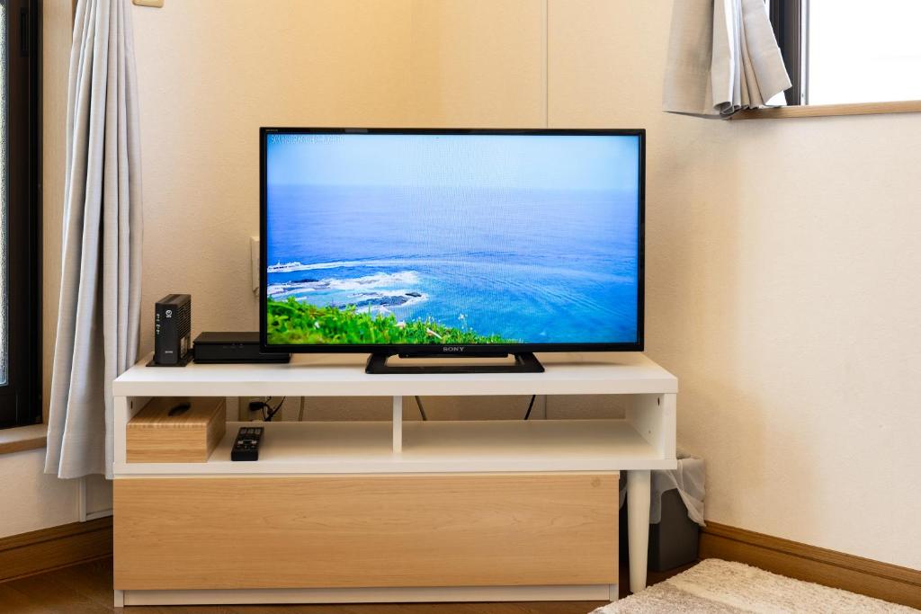 VILLA MorEにあるテレビまたはエンターテインメントセンター