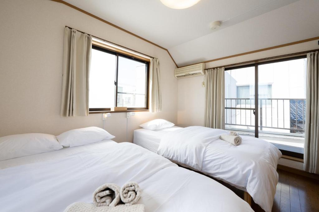VILLA MorEにあるベッド