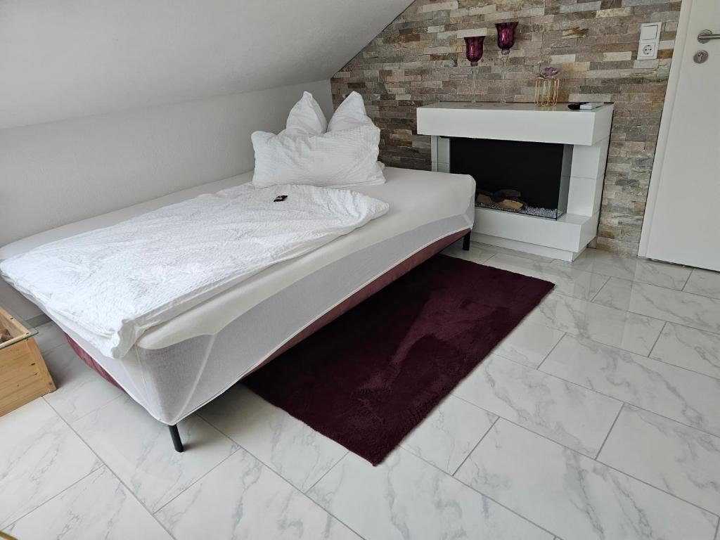 Postel nebo postele na pokoji v ubytování Stengels Sekt Appartements