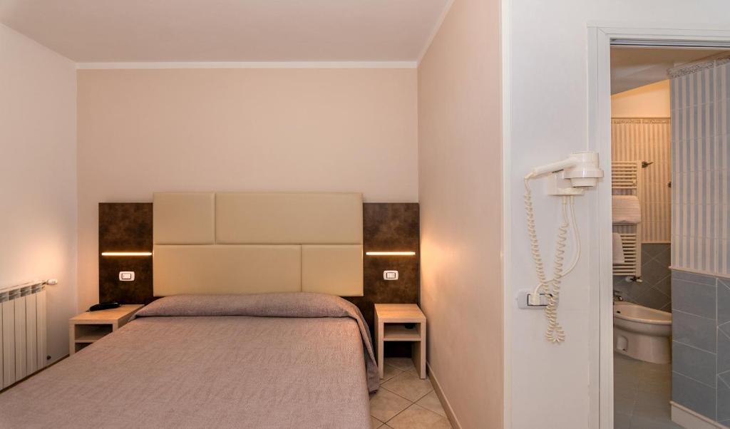 Postel nebo postele na pokoji v ubytování Hotel Eura