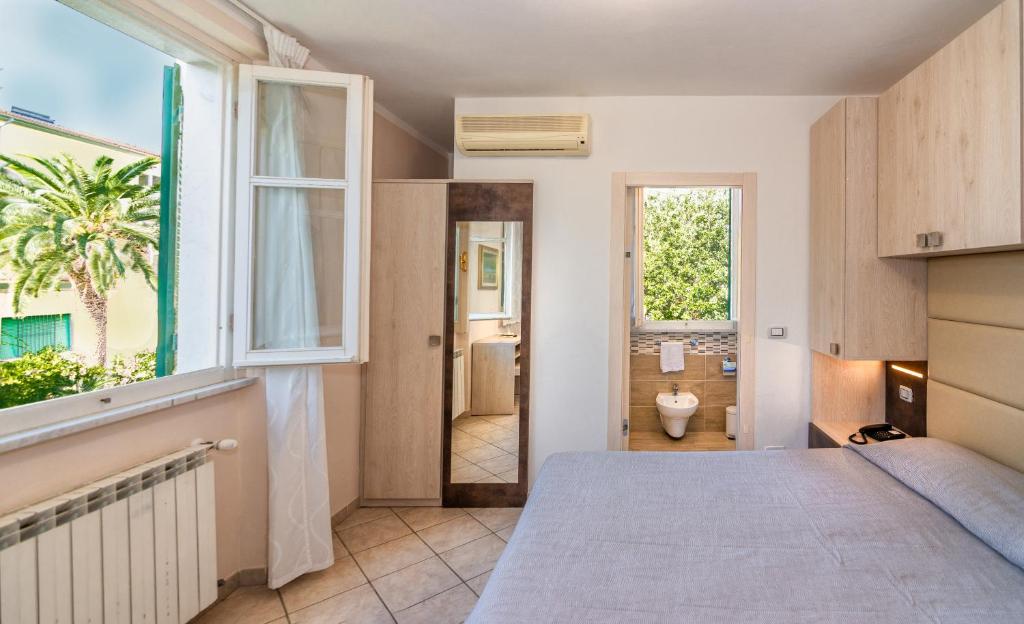 Postel nebo postele na pokoji v ubytování Hotel Eura