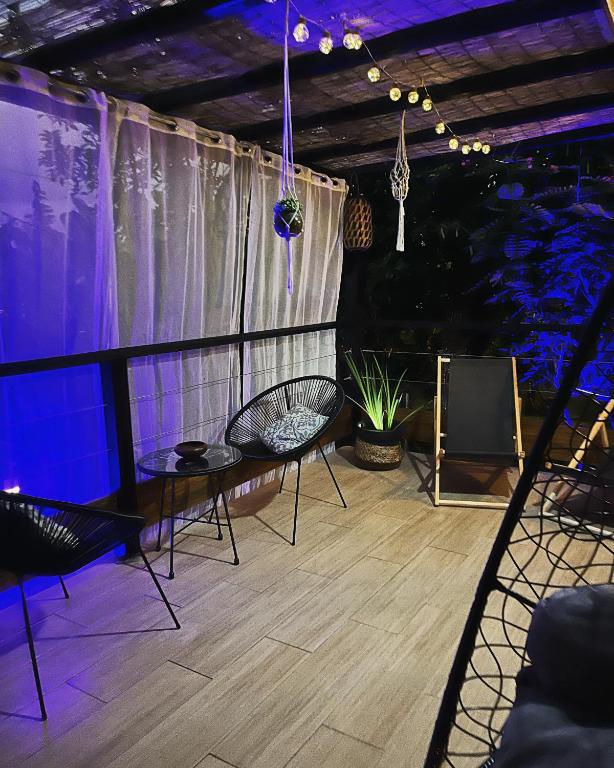 Posezení v ubytování Cocon des jardins - Bungalow & SPA