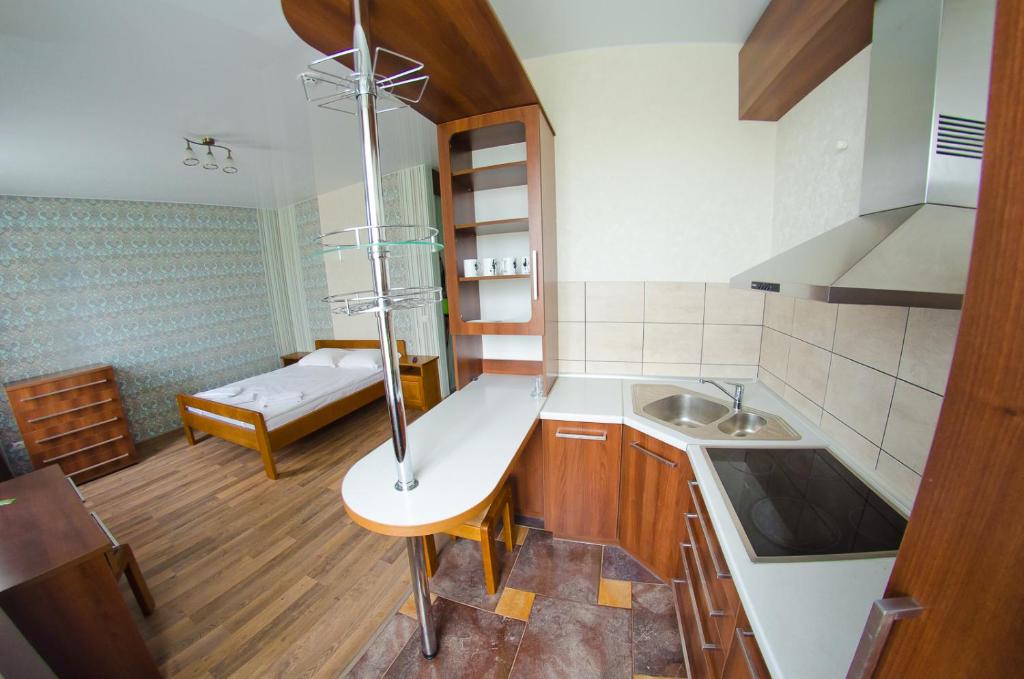 A kitchen or kitchenette at Hotel Resttime