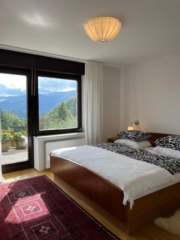 Voodi või voodid majutusasutuse Lakeview Guesthouse & Chalet Bled toas