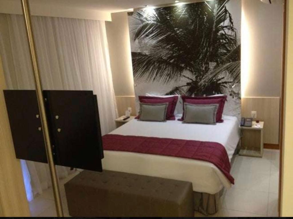 Postel nebo postele na pokoji v ubytování Flat Boulevard Side 2104 Altissimo Padrão com Lazer