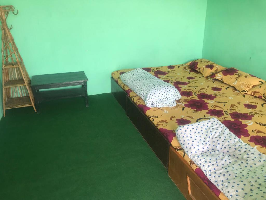 Postel nebo postele na pokoji v ubytování Sunrise Point Homestay