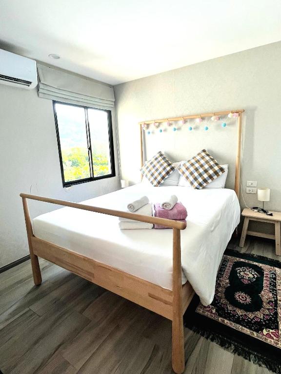 a bedroom with a large bed with a teddy bear on it at А2 ВАТСАП669З582I976 примем РУБЛИ in Nai Yang Beach