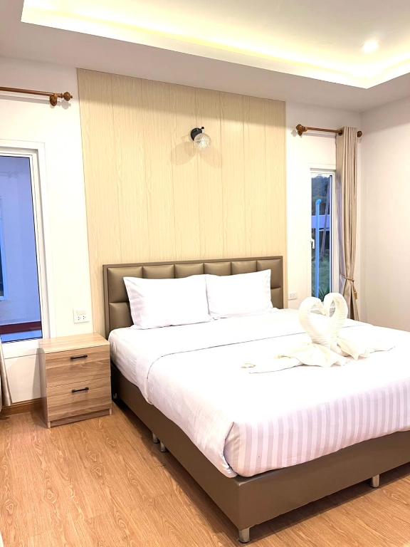 Postel nebo postele na pokoji v ubytování Koh Yao Modern Inn -SHA Plus