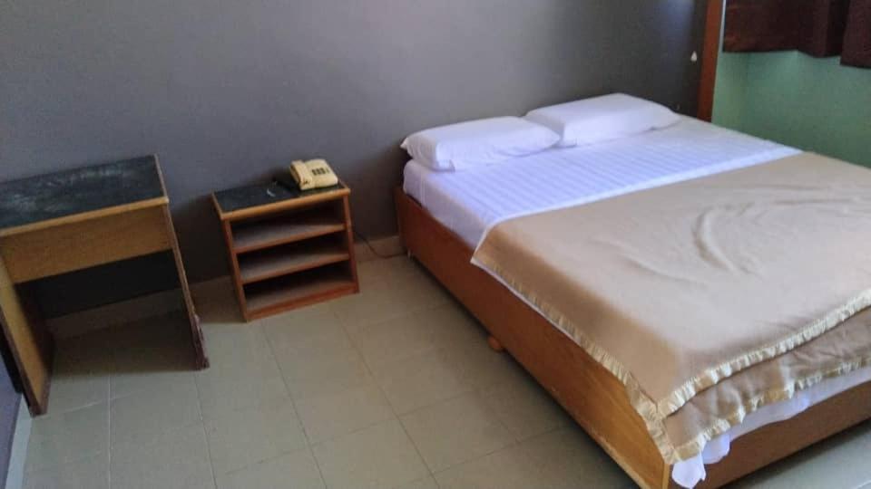Postel nebo postele na pokoji v ubytování SUSAN HOTEL SEAFRONT